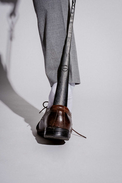 Forged long shoehorn with wall screw